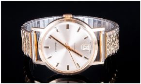 Garrards 9ct Gold Automatic Date Just Wristwatch fitted to a gold plated expanding bracelet. Fully