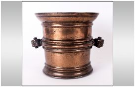 Early Bronze Mortar With a Ribbed Body, With Hands Carrying Handles, 17th Century. Height 6.5