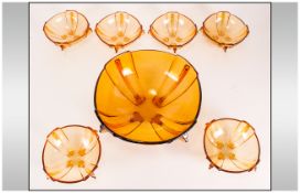 Amber Coloured Glass Fruit Set comprising large bowl and 6 sundae bowls.