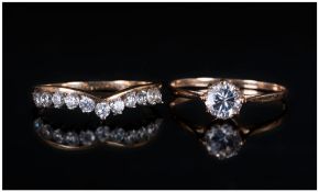 Ladies 9ct Gold Set C.Z Dress Rings, 2 in total. One single stone ring. The other 1/2 eternity ring.