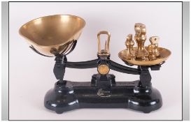 Libra Scale Co Late 19th Century Black Cast Iron Kitchen Scale & Weights. with sturdy pair of