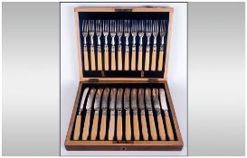 Antique Set Of Mahogany Cased Fruit Knives & Forks, with engraved decorations, 24 pieces.