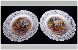 Pair of Hand Painted Cabinet Plates, signed P.Gosling, decorated with opposing rural scenes with a
