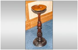 Reproduction Mahogany Carved Pillar Stand with Round Top and Shaped Column on Round Base. 40