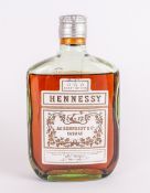 A Vintage Bottle Of Hennessy & Co 3 Star Congac, 700 Proof, Dated 1951. Seal intact.