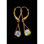 Pair of Opal Pendant Earrings, each earring holding a round cut, faceted opal in a semi-bezel