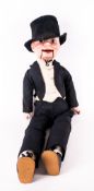 Kenny Tok Ventriloqist's Dummy, manufactured by the Reliable Toy Company, Canada; the dummy, dressed