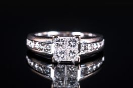 18ct White Gold Diamond Set Ring, The central four claw raised platform set diamonds with