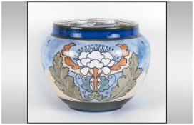 Royal Doulton Stoneware Jardiniere With stylized floral decoration. D3893, Circa 1910. All aspects