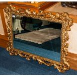 Composition Rococo Shaped Gilded Wall Mirror, With Bevelled Mirror. 40 x 30 Inches.