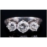 A Platinum Set 3 Stone Diamond Ring, round brilliant cut diamonds, centre stone VS1 - VS2 Clarity,