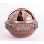 Bahia Large Carved Round Brazil Nut POd with  heavy outer shell cut away to reveal individual nuts