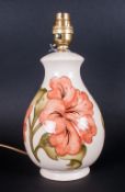 Moorcroft Lamp Base 'Coral Hibiscus' On Cream Ground. Impressed Moorcroft mark to base. Stands