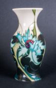 Moorcroft Tubed Lined Modern Vase 'Sea Holly' Design by Emma Bossons, Circa 2007. 5'' in height.