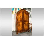 A Burr Walnut Queen Anne Style Double Door Panel Door Front Wardrobe, with a Shaped Canopy Top and