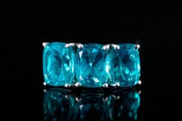 Blue/Green Sea Colour Quartz Trilogy Ring, three matching elongated cushion cut stones, totalling