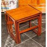 A Good Quality G Plan Type Nest Of Three Contemporary Teak Interlocking Tables, 18'' in height, 18''