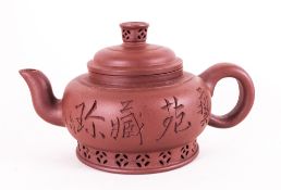 A Chinese Brown Stoneware Teapot with Chinese characters to the side, full impressed marks to the