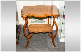 An Edwardian Walnut Shaped Top Occasional Table on Cabriole Style Legs, Supporting an Under Shelve.