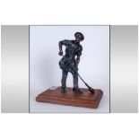 Bronzed Figure Of An Iron Founder Holding A Metal Ladle on wooden base. 12'' in height.