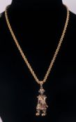 A 9ct Gold Articulated Figure Of A Clown, set with Rubies & Diamonds attached to a 9ct gold rope