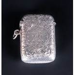 Victorian Silver Hinged Vesta Case With Stylized Chased Decoration. Overall condition is
