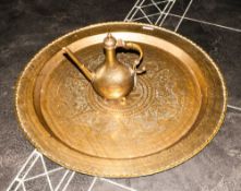 A Large Chinese Brass Table Top with engraved Chinese characters to the centre with a floral