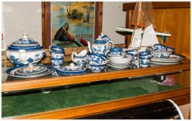 Booths Real Old Willow Pattern Part Dinner Service, Comprising cups, saucers, tureens, plates etc.