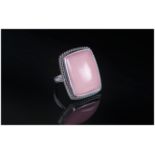 Pink Opal Cabochon Ring, a hand crafted ring with a 30ct solitaire cabochon pink opal, mined in