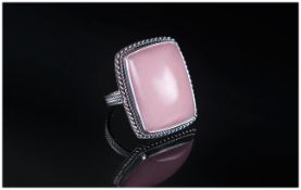 Pink Opal Cabochon Ring, a hand crafted ring with a 30ct solitaire cabochon pink opal, mined in