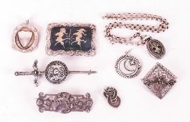 Collection of Eight Miscellaneous Items of Silver Jewellery comprising three pin brooches in the