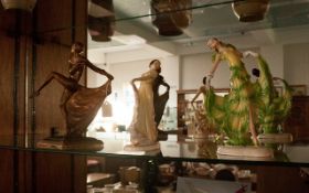 Three Art Deco 1930's Dancing Girls, two figures in Decorated porcelain, one in plaster, gilt