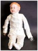 1930's Celluloid Doll, dressed in original white satin dress. 20 inches long.