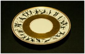 A French Porcelain Saucer Dish circa 1900. Decorated with black painted silhouette dancing