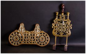 Two Brass Victorian Trivets (Home Sweet Home) caption to one. Together with an iron last.