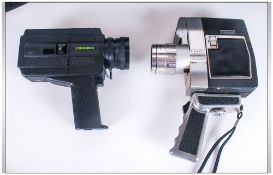 2 Hard Cased Cine Cameras with instructions.