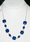 Lapis Lazuli and Silver Chain Necklace, 44cts of extremely high quality lapis, bezel set, with