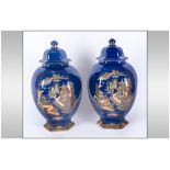 A G Harley Jones Pair of Large Chinoiserie Cover Vases, the hexagonal, bulbous bodies decorated with