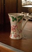 Mailing Lustre Finish Jug, decorated with raised flowers in pinks & greens. 12'' in height.