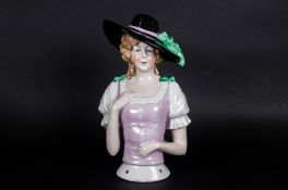 1930's Porcelain Figure of a Lady In Flamboyant Hat and Laced Up Front Dress. Impressed B5421,