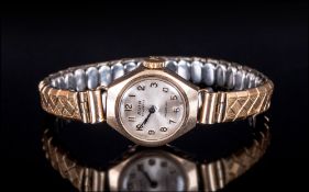 Avia 9ct Gold Cased Ladies Wrist Watch on a Gold Plated Expanding Bracelet. c.1950's. A/F.
