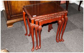 Nest Of Three Tables In The Queen Anne Style with glass tops on carved cabriole legs, Mahogany