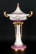 Mintons Fine Twin Handled Pedestal Lidded Vase In The Classical Style with white, pink & gold