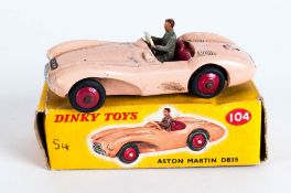 Dinky Toys No 104 Aston Martin DB3S Diecast Model. Pink Body, Red Seats, Diecast Hubs & Grey Driver.