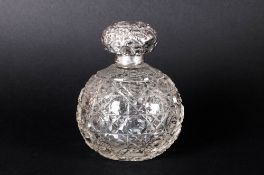 Edwardian Silver Topped and Cut Glass Global Shaped Perfume Bottle. Hallmark Birmingham 1905. Stands