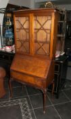 A Small Reproduction Walnut Queen Ann Style Ladies Bookcase with an Astral Glazed Top, Fall Down