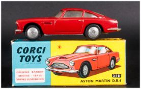 Corgi Toys No 218 Aston Martin D.B.4, Brick Red Body, Complete With Blue/Yellow Picture Card Box,