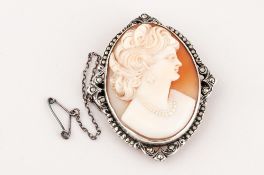 A Large Cameo Brooch. 1.1/4 x 1.1/2 Inches. In a Silver Mount, Set With Marcasite. Complete with
