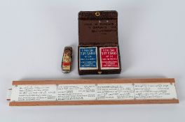 A Slide Rule in case by USRC Unique. Together with commemorative penknife 1953 and a Little Duke two
