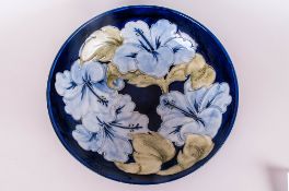 Moorcroft 'Blue Lilies' Bowl, initialled for John Moorcroft, showing pale blue lilies with light